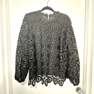 Sheer black lace shirt. Similar top worn by Tinsley Mortimer on RHONY.